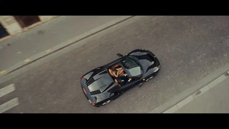 A black convertible driving through Paris, the opening shot of an AI beauty ad made with Seedance 2.5 in Filmera