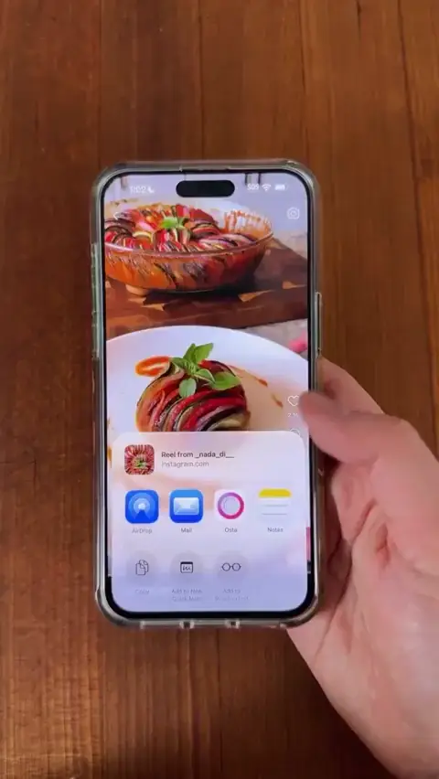 Phone plays the same Reel and shares it to Osta
